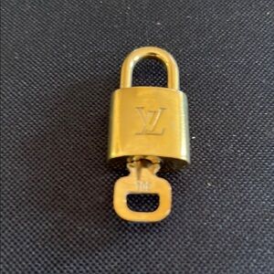 Louis Vuitton Gold Padlock with Key